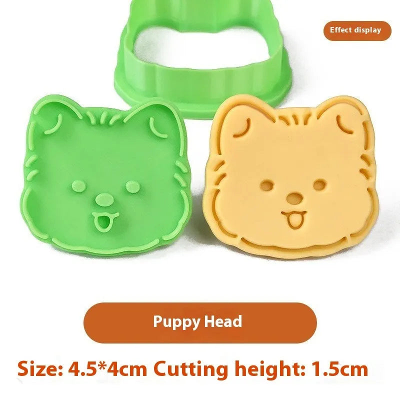 Plastic 3D cartoon puppy biscuit mould showing seven style variations including birthday hat and swimming ring designs