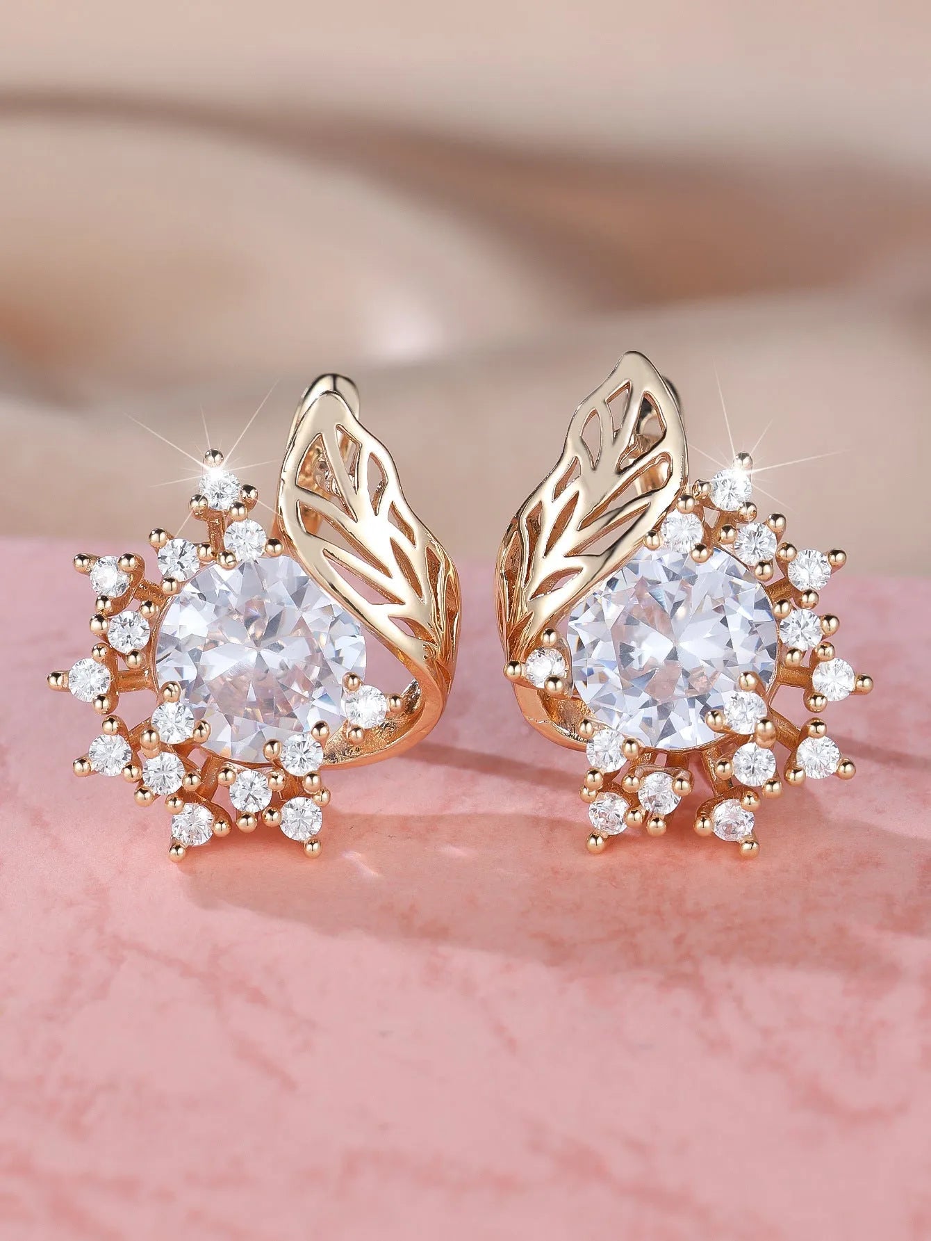 Round floral feather earrings with zircon diamonds in rose gold setting