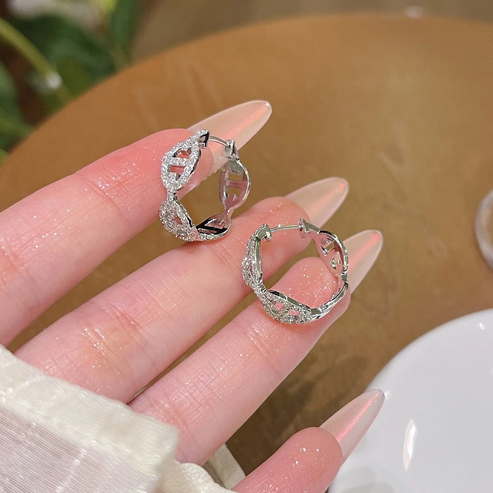 A pair of casual women's earrings with thick gold plating in a choice of silver, gold, or rose gold colour.