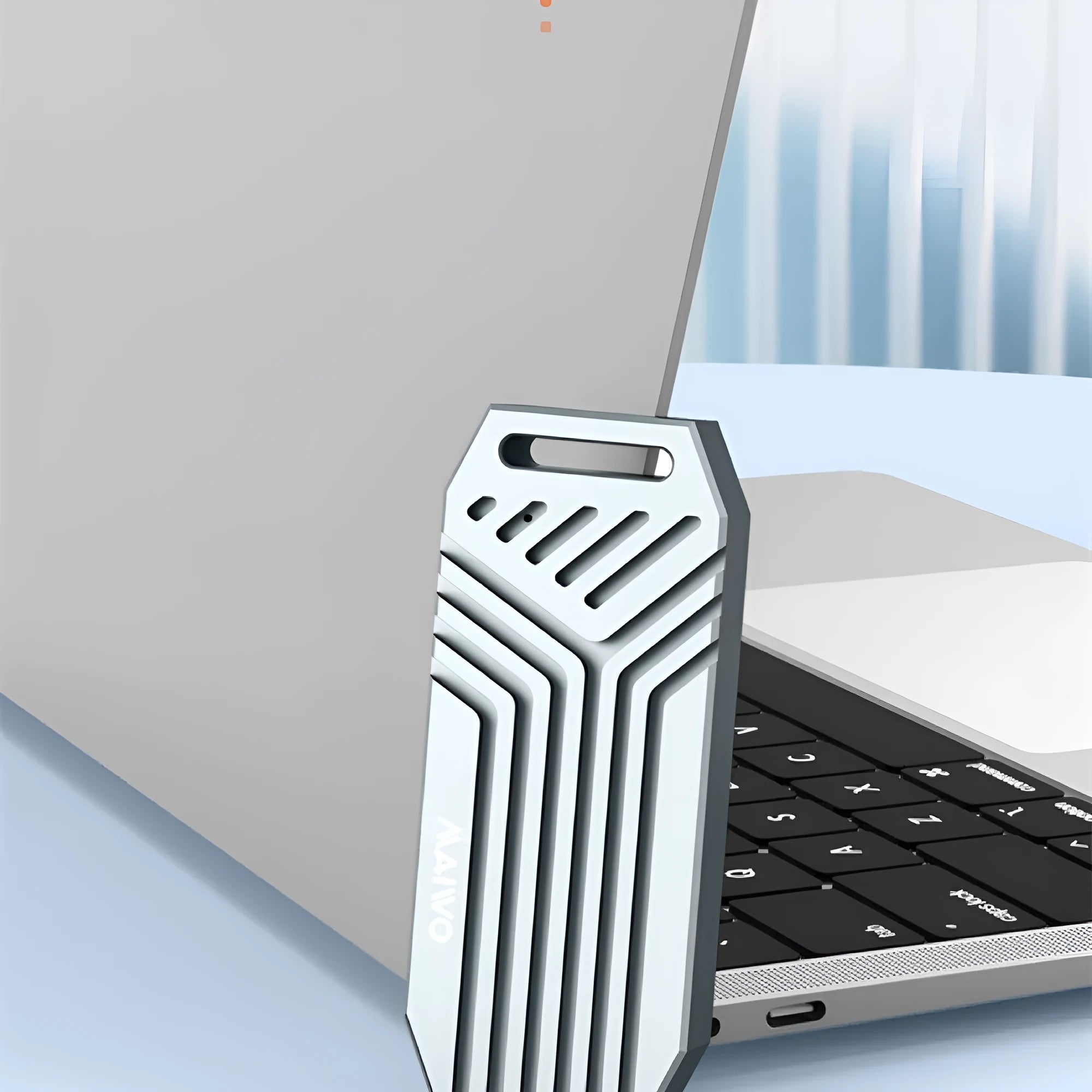 Silver Thunderbolt 4 external SSD enclosure for M.2 drives, showing compact aluminium design.