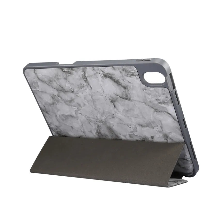 Tri-fold imitation leather iPad case with marbling pattern and a visible pen slot on the side.
