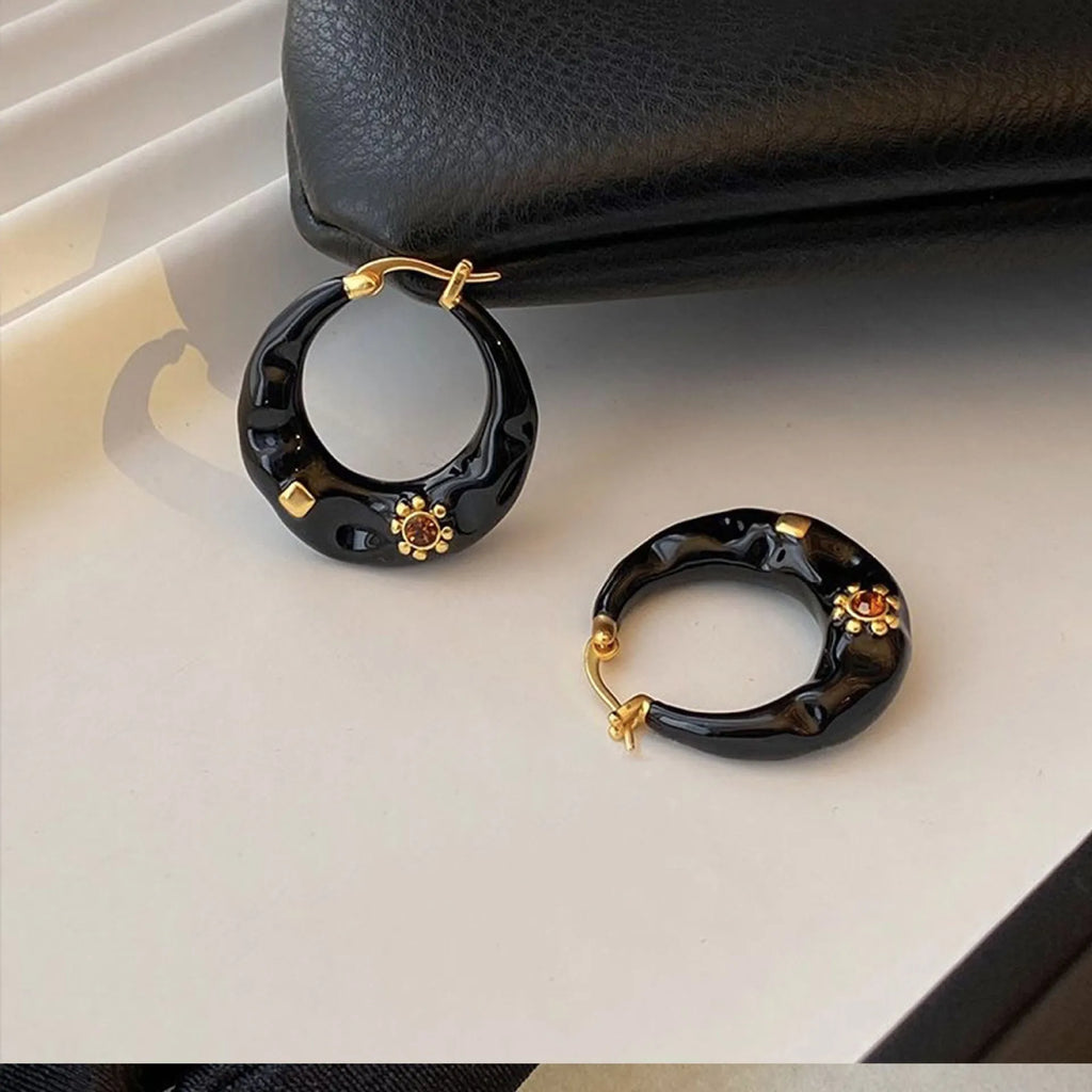 Retro Hong Kong style ear studs with rhinestone inlay and dripping oil textured finish in black and red colours