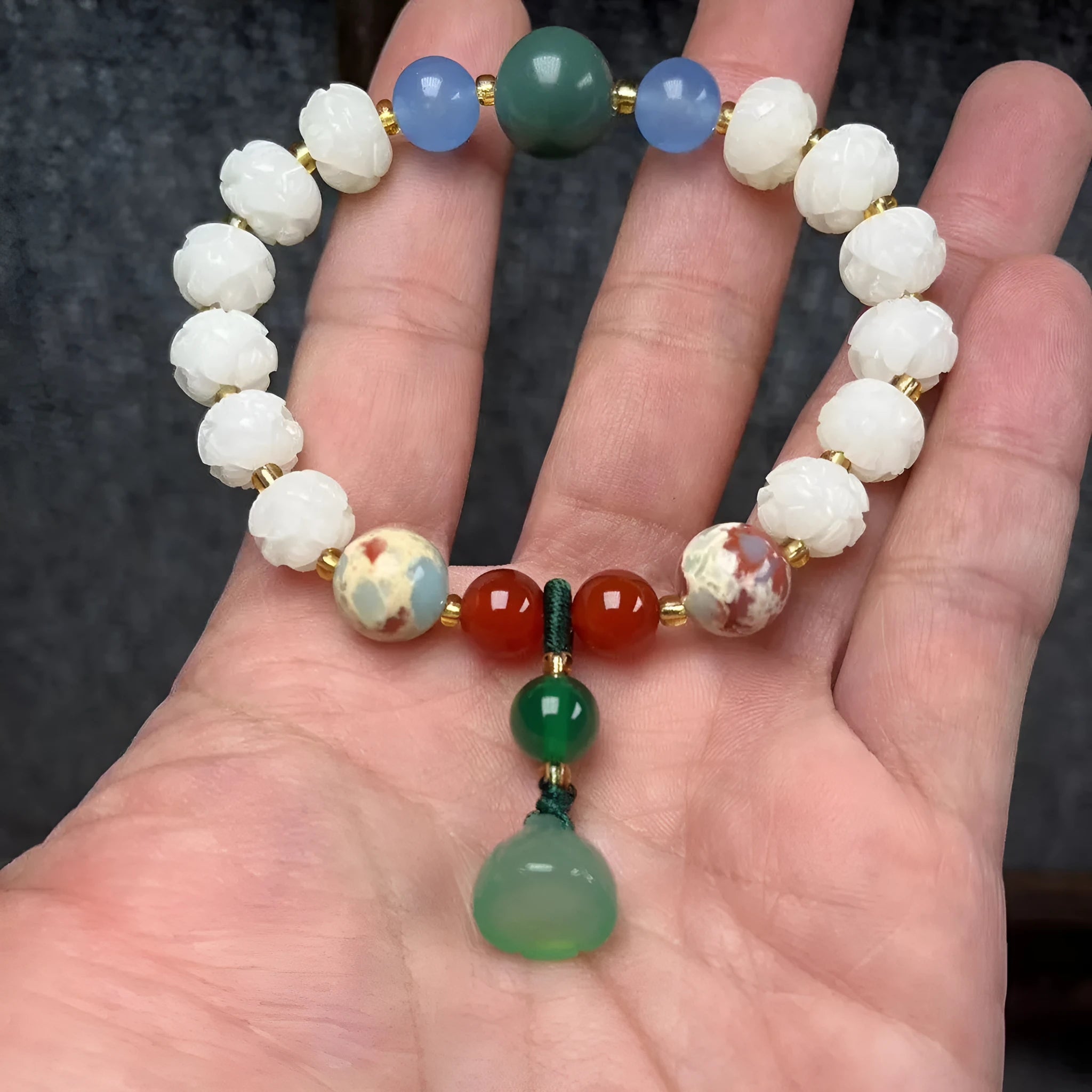 Carved pumpkin lotus Bodhi root bracelet with white jade beads and multiple dimensions