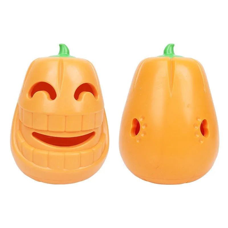 Halloween pumpkin shaped interactive dog chew toy with treat-dispensing funnel design