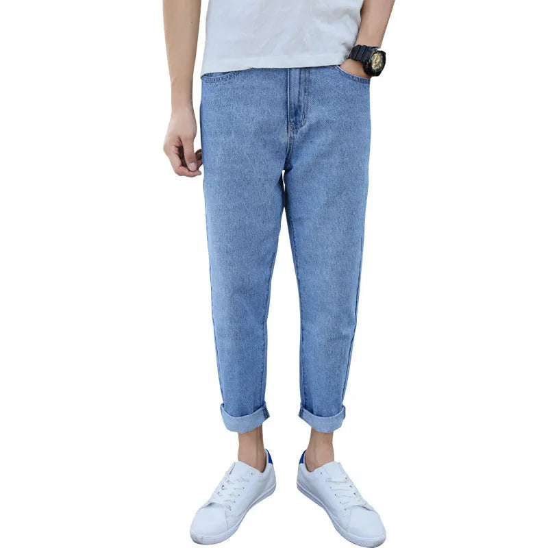 Men's loose straight leg harem jeans in black or blue cotton fabric with college style