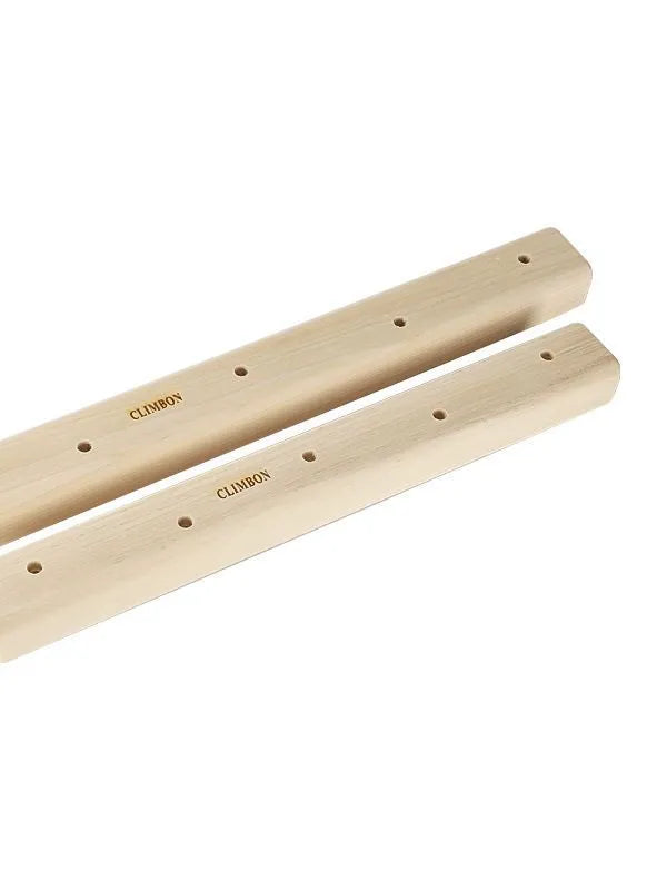 Set of three solid wooden fingerboard hangboards for grip strength training in different lengths.