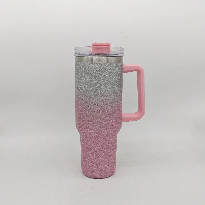 Large stainless steel vacuum insulation cup with gradient colour finish showing double-layer construction