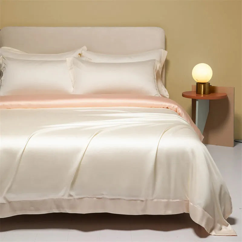 Lenzing Tencel quilt cover and sheet set in a modern colour like Aurora Blue, showing satin weave texture.
