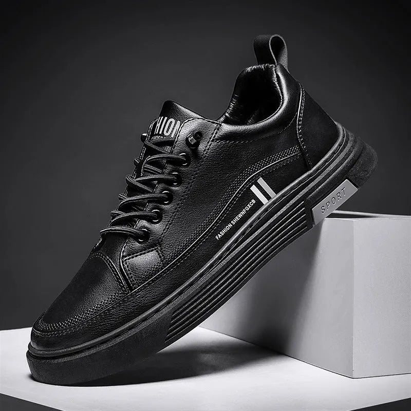 Men's low-top skateboard shoes with elastic band, microfiber upper, and rubber sole in black or white.