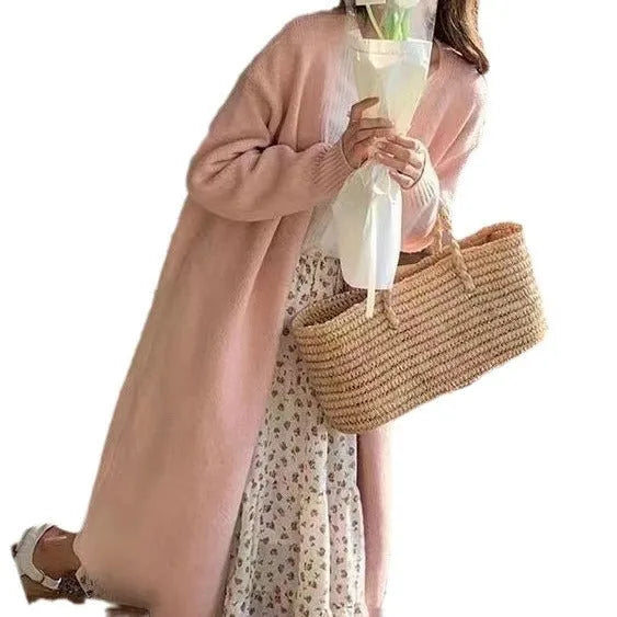 Women's loose-fit knitted cardigan with V-neck in khaki colour, showing mid-length 65cm design