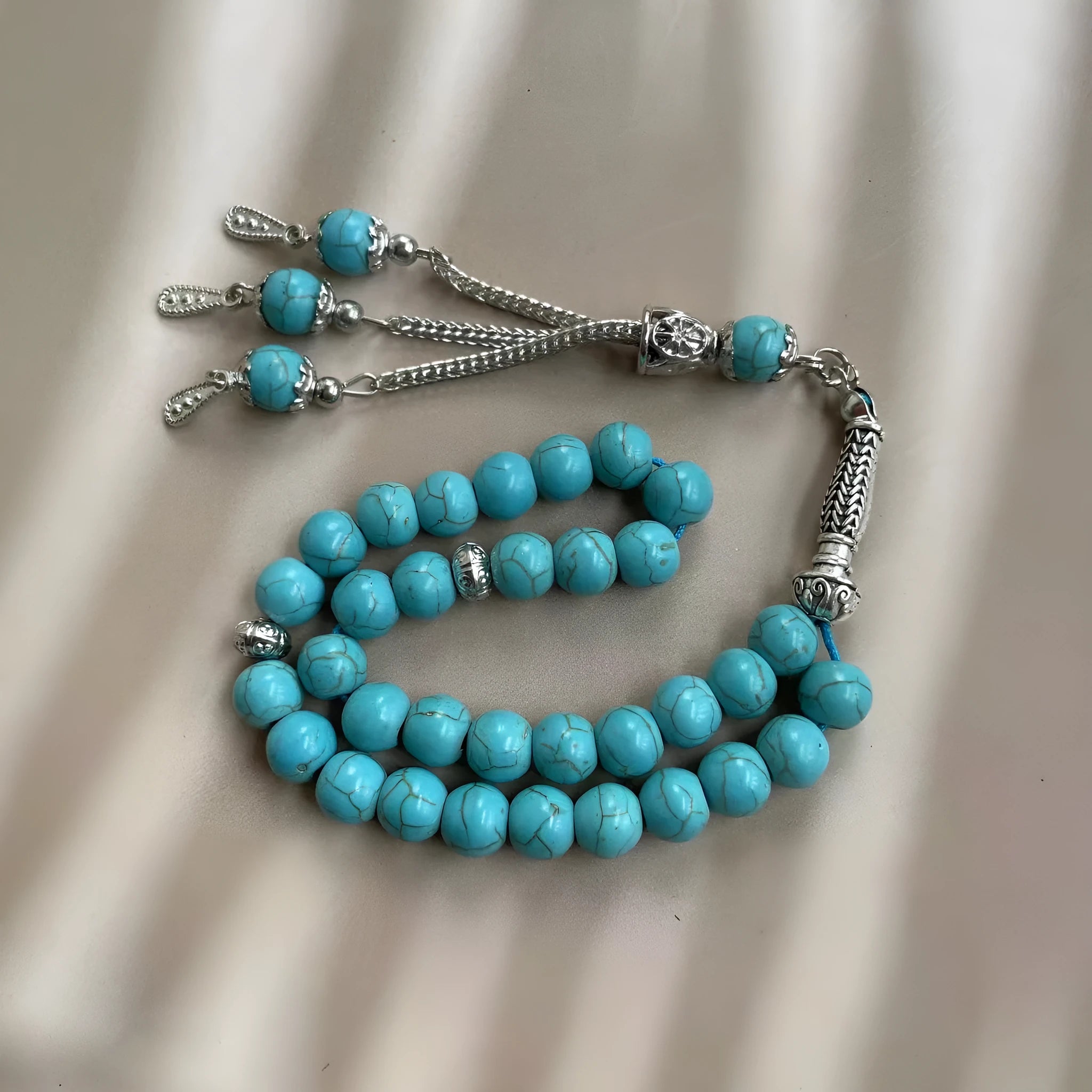 Handmade Muslim worship bracelet with sky blue 8mm stone beads for daily dhikr reminders.