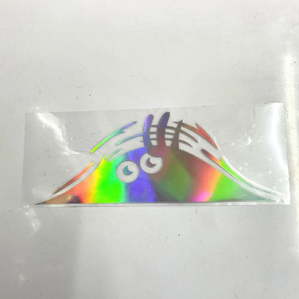 Large 19cm by 7cm self-adhesive body sticker showing a colourful smiley face design on skin.