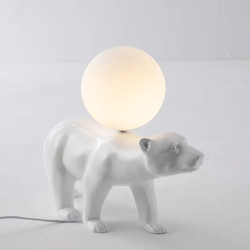 Modern Nordic style white bear table lamp in sitting posture on bedside table