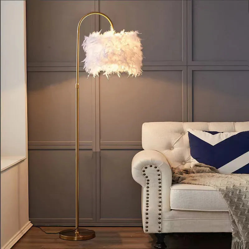 LED white feather floor lamp with gold copper finish and curved iron stand 155cm tall