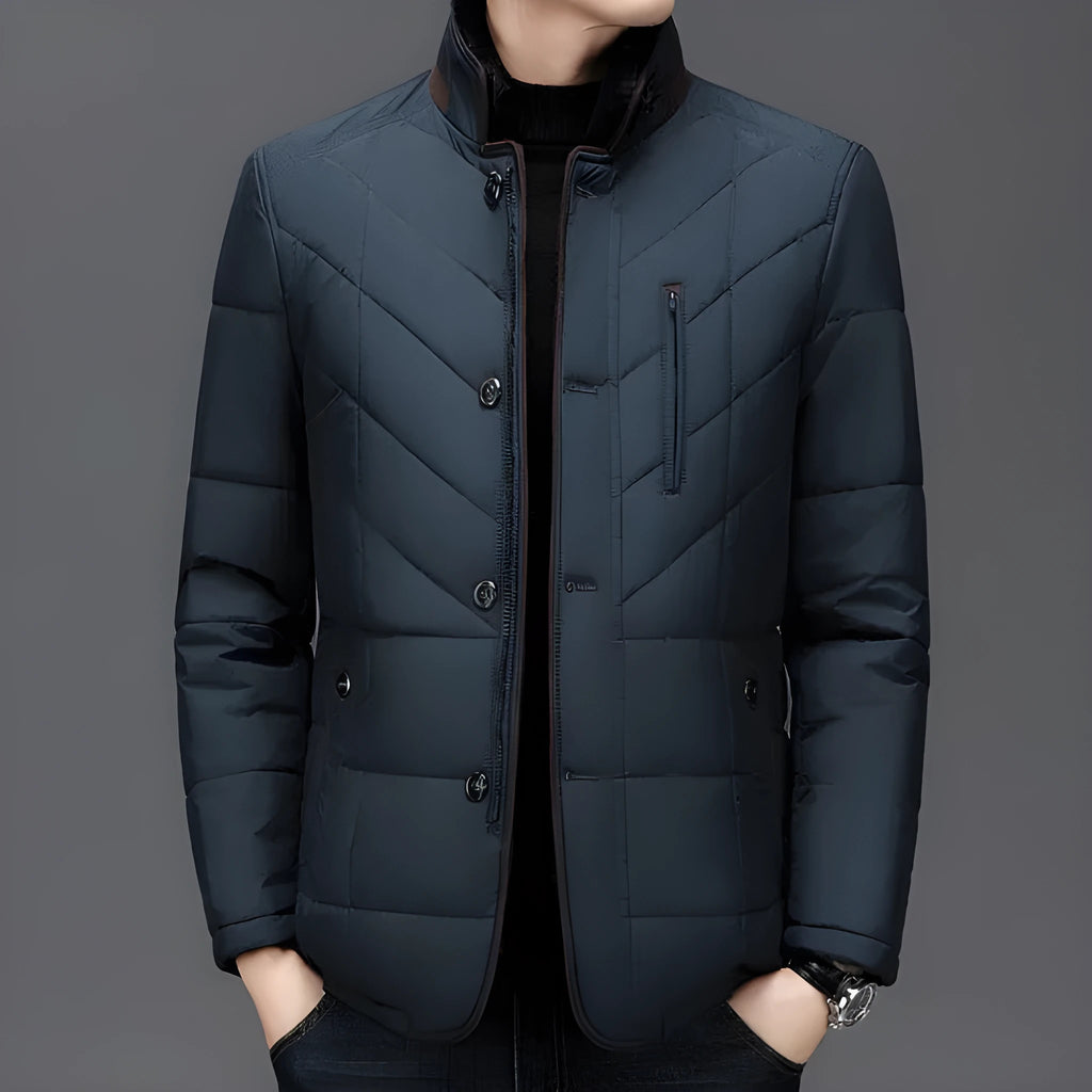 Men's solid colour winter padded coat in dark blue, shown with side seam pockets.