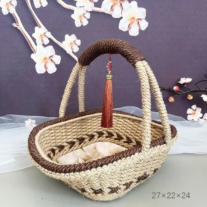 Hand-woven straw basket with hemp rope detailing in rustic farmhouse style