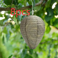 Paper and wire beehive lantern with honeycomb structure, 22 cm wide by 28 cm high.