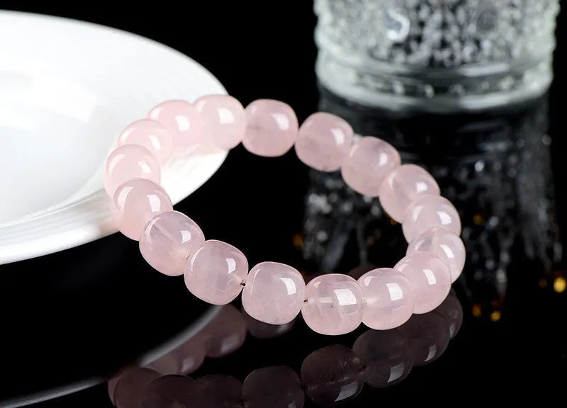 Pink crystal barrel bead bracelet with 11-12mm geometric beads and original design