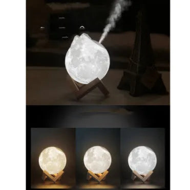 Spherical white Lunar humidifier night light with USB charging port and essential oil bottle
