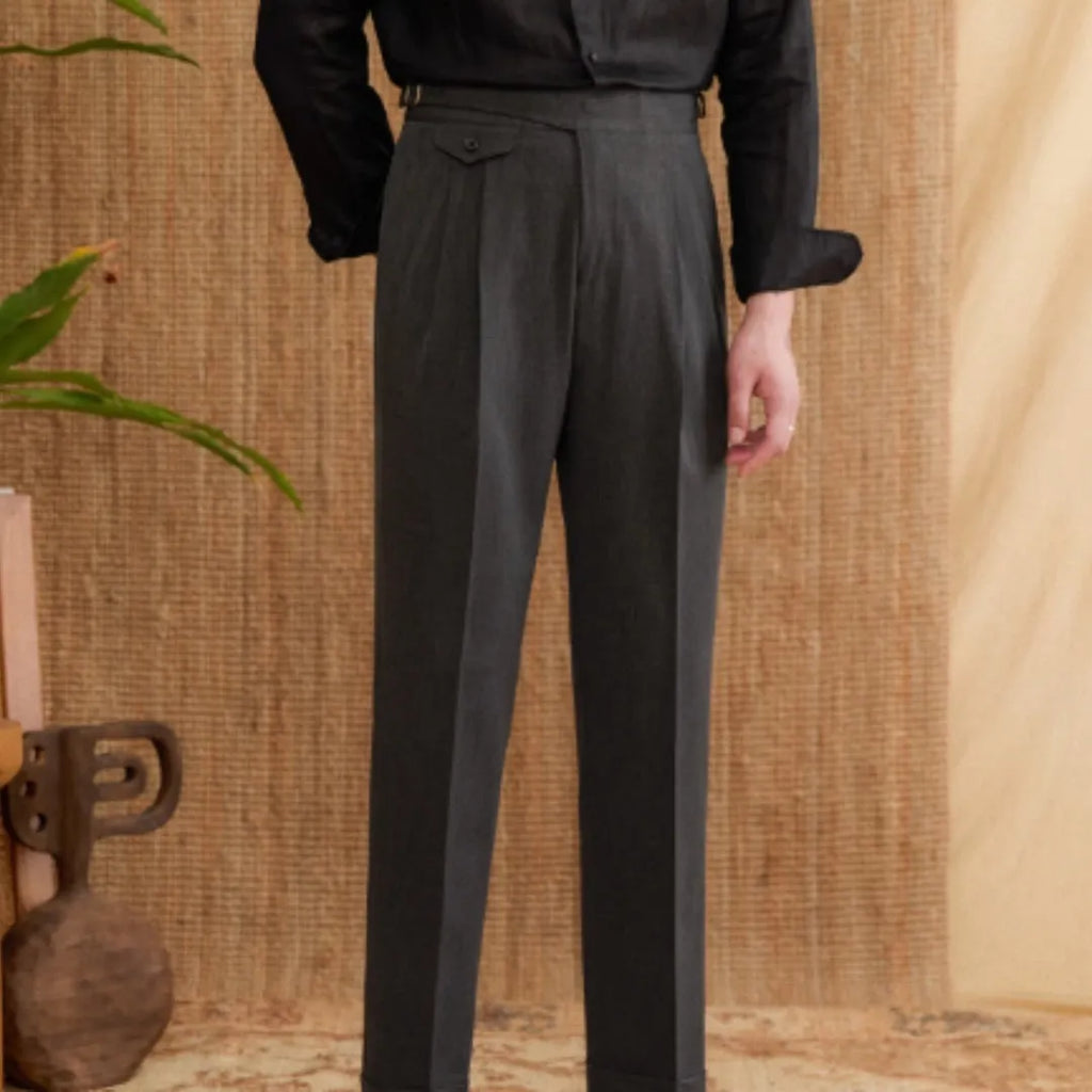 Men's slim fit straight leg business trousers in dark grey, shown in a professional setting.