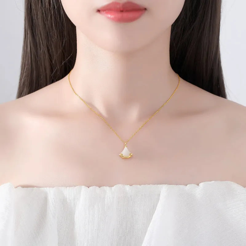 S925 sterling silver Hetian jade skirt pendant necklace on display with 40cm chain