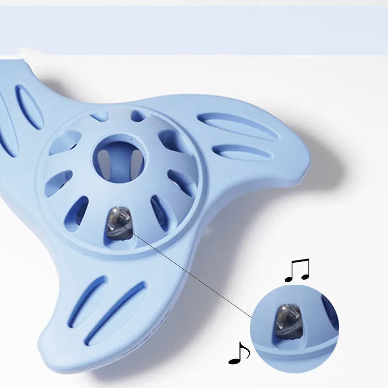 Blue boomerang-shaped bite resistant dog chew toy for large breeds on a plain background