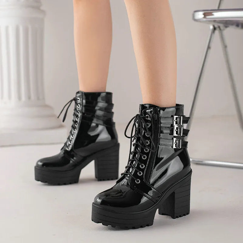 Women's black thick-heeled casual short boots with round toe and front lace-up.