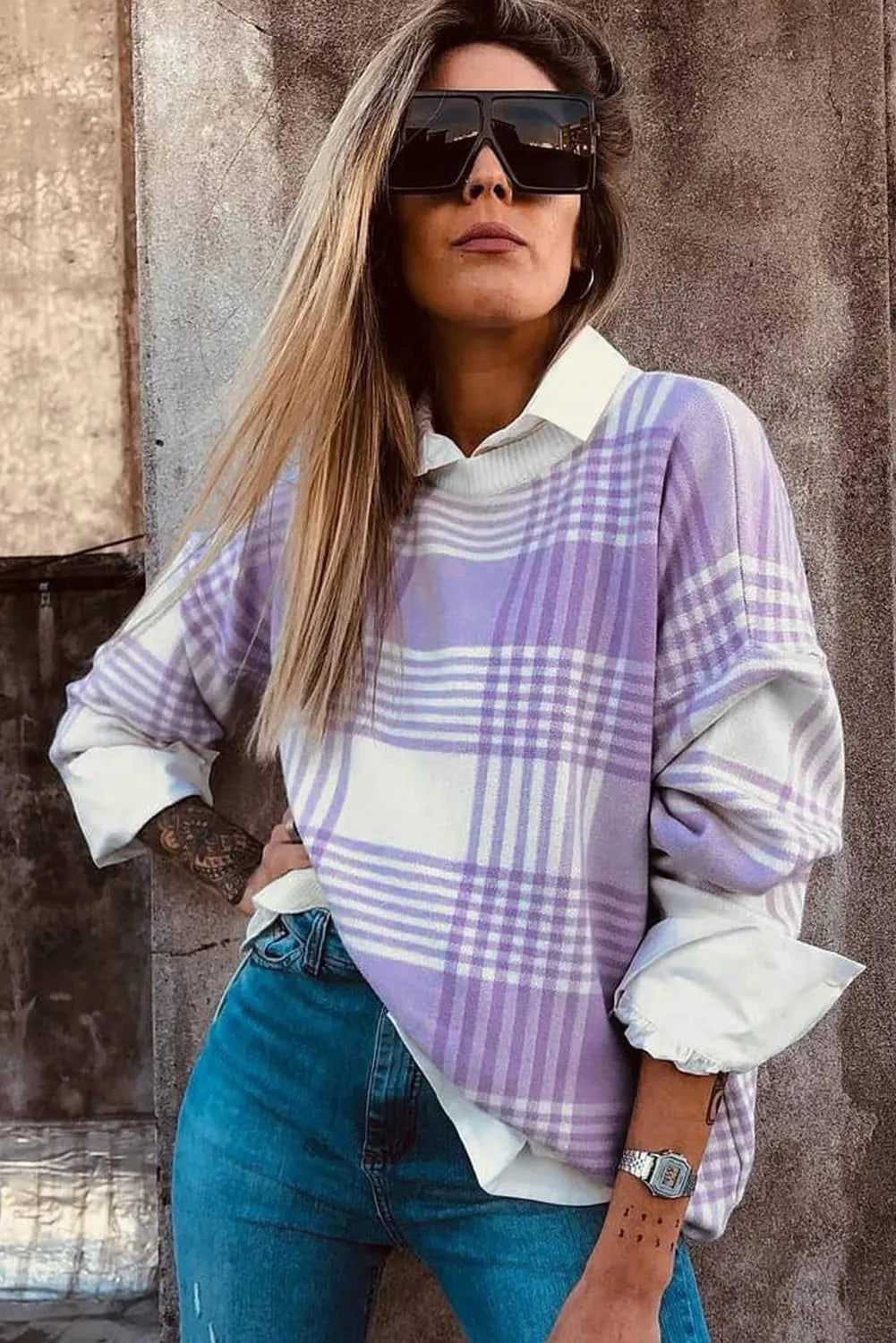 Lilac plaid print loose-fitting long sleeve women's sweater with ribbed trim detail.