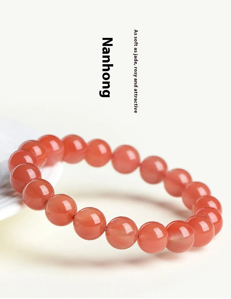 Natural Cherry Red Agate bracelet with polished beads, shown in a single circle configuration.