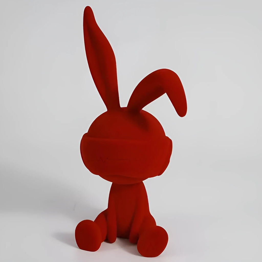 Suede blindfold rabbit resin table ornament in green, blue, or red colour options.