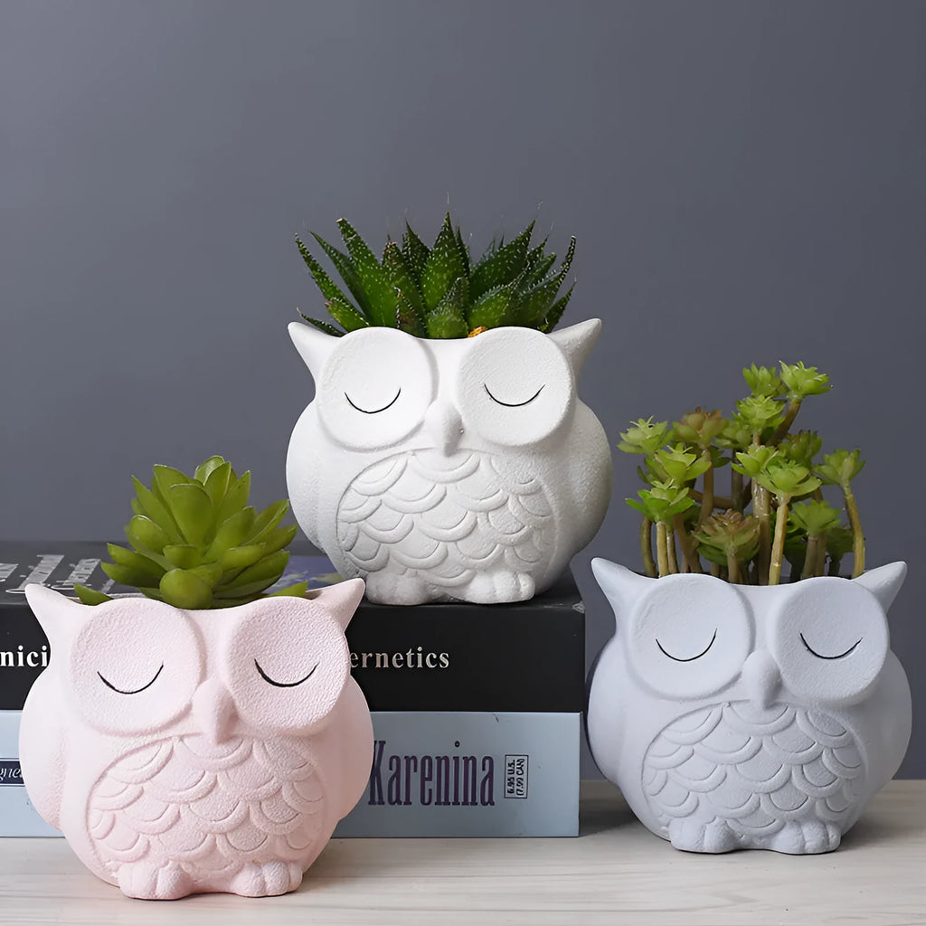 Handmade frosted ceramic owl design succulent flower pot in light pink colour.