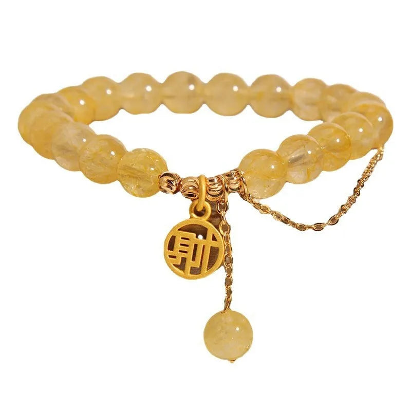 Natural citrine bracelet with Chinese character design and tassel detail