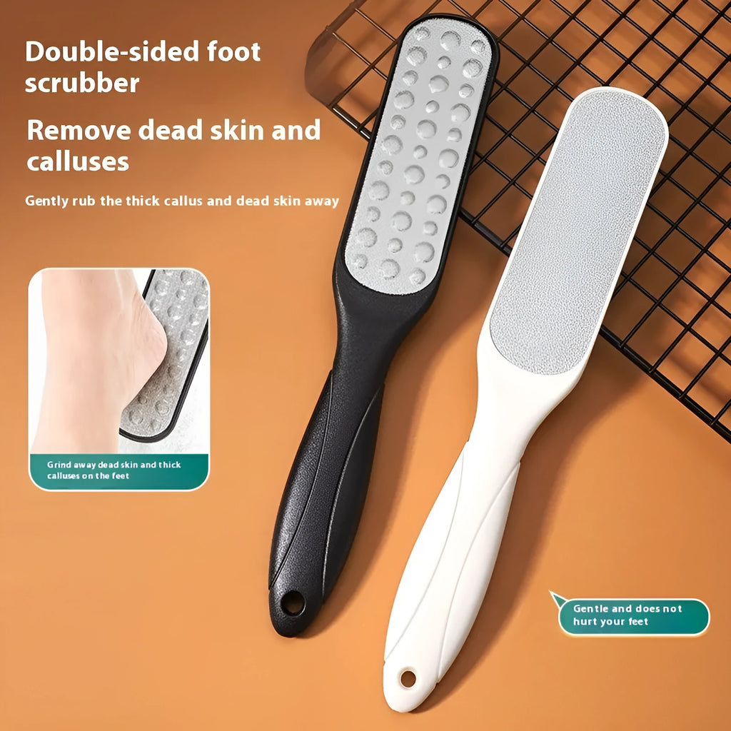 Stainless steel double-sided foot grinder with white and black abrasive heads for callus removal