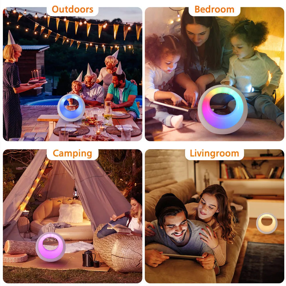 Small RGB colour changing desk lamp with remote control on wooden surface