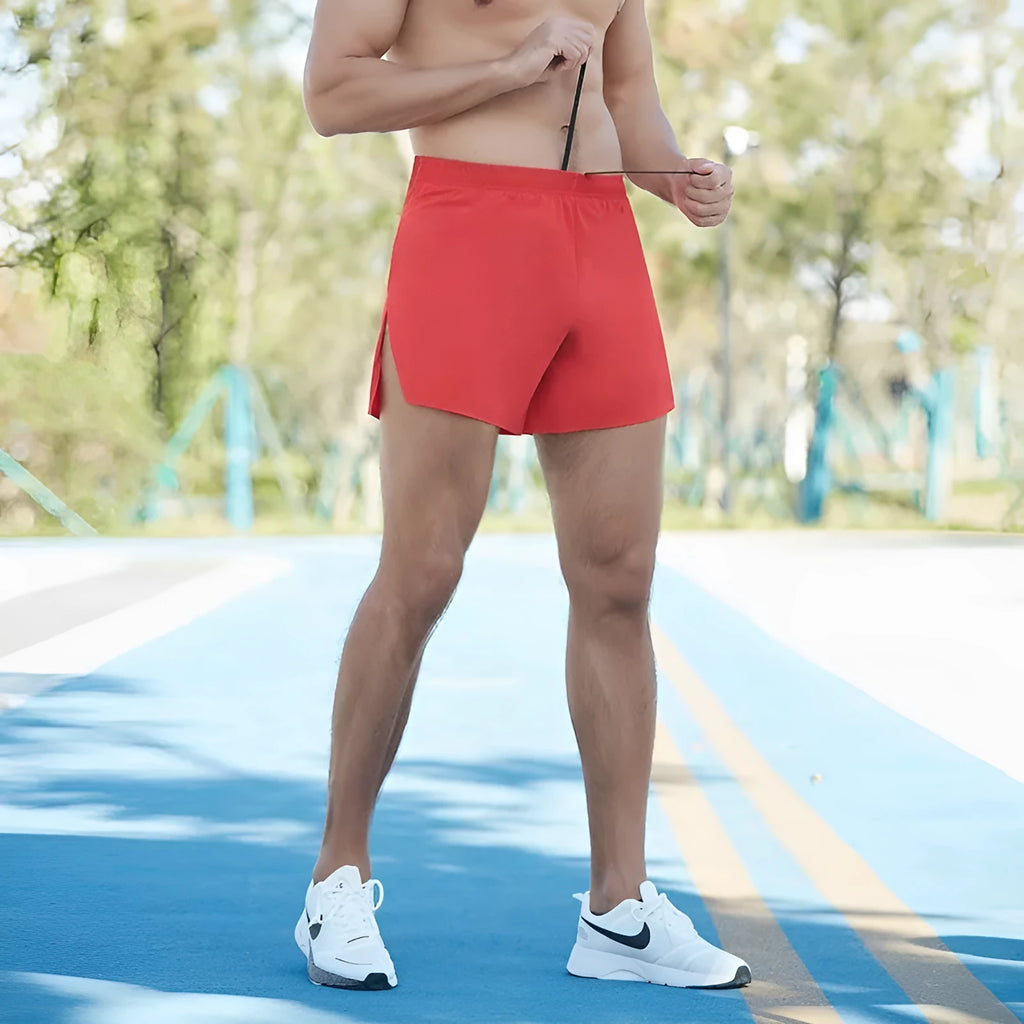Men's black off-road running shorts with high-waist design and loose fit for marathon sports