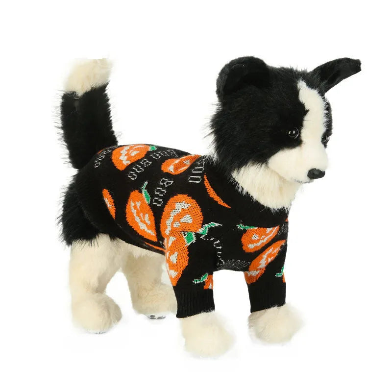 Black dog sweater with an orange pumpkin pattern for Halloween, shown on a model dog.