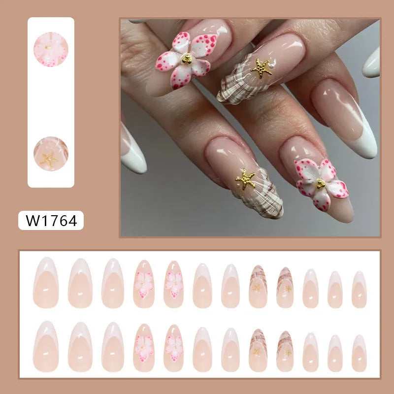 French style press-on false nails with simple flower and rock pattern design, colour W1764, in a plastic kit.