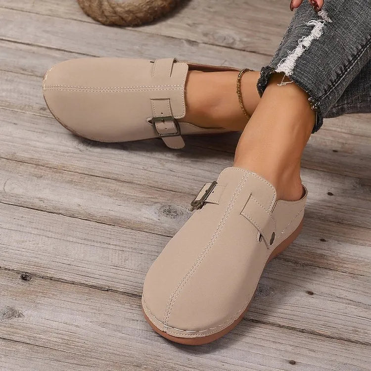 Women's casual wedge slippers with closed toe, cloth upper in multiple colours, and rubber sole.