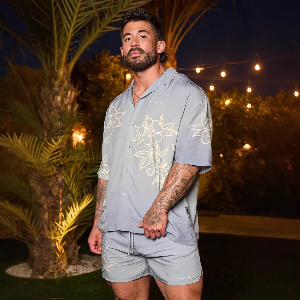 Men's printed casual short sleeve shirt with floral pattern in loose fit polyester fabric