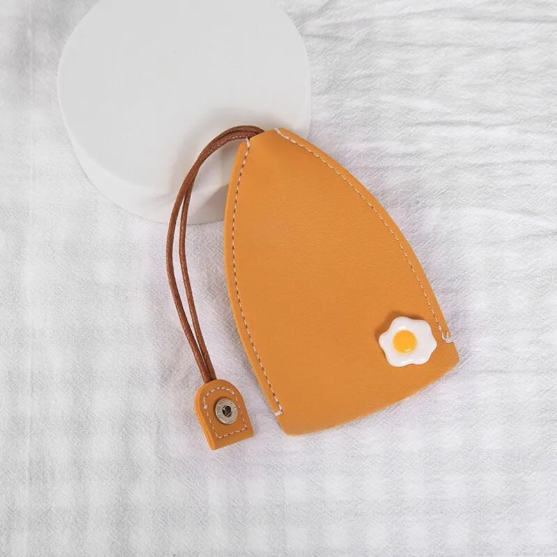 Cartoon style pull-out car key case made from PU leather in assorted designs