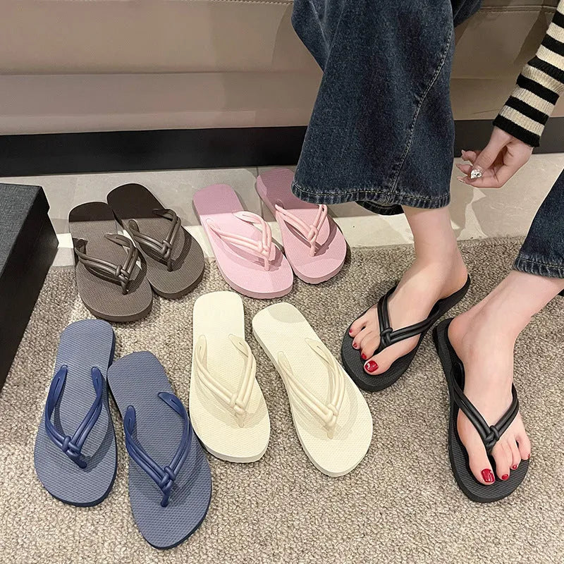 Women's casual PVC flip flops with toe covering style and injection moulded non-slip sole in multiple colour options.