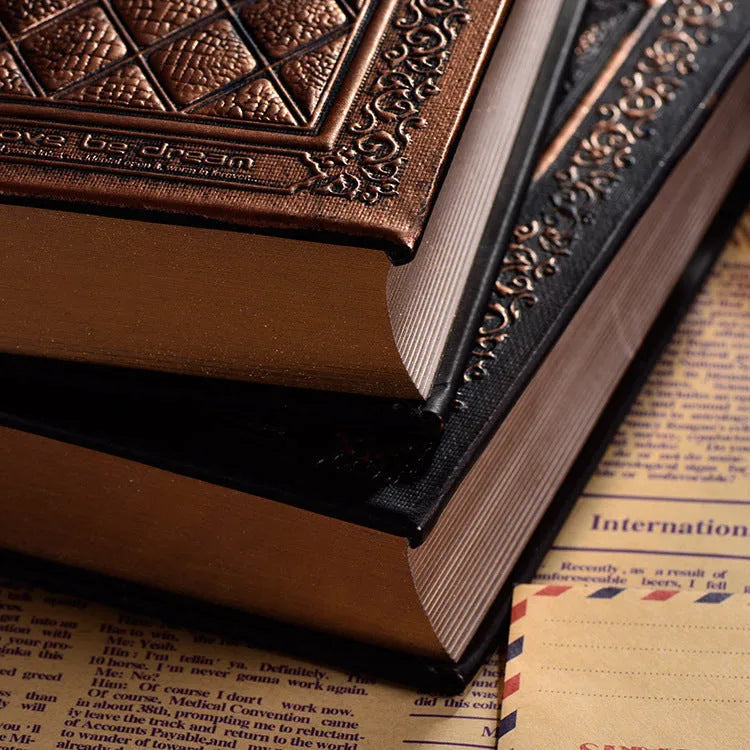 Embossed faux leather notepad with three-dimensional cover design in bronze colour