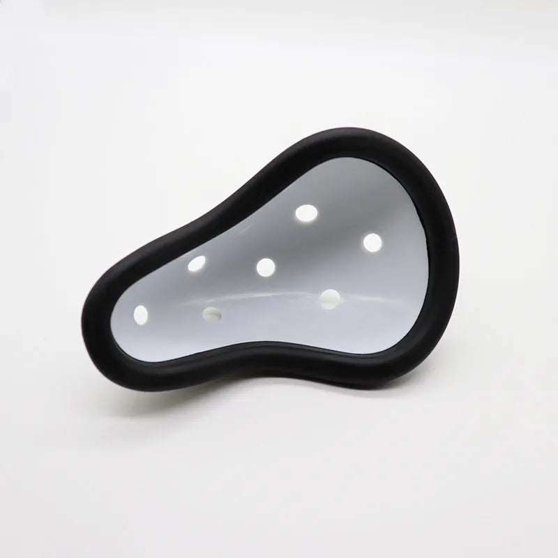 Rubber sports genital protector for adults and children, used in boxing, rugby, hockey, and martial arts.