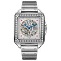 Men's square-faced automatic watch with diamond detailing on a stainless steel bracelet
