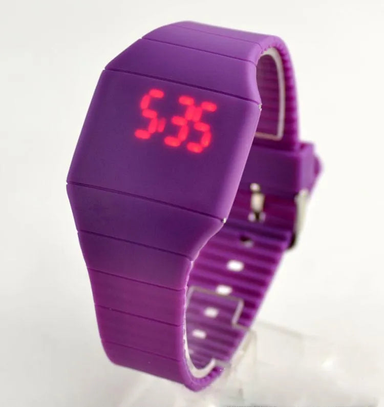 Square digital electronic watch with touch screen on a coloured PU strap, showing a number display with calendar.