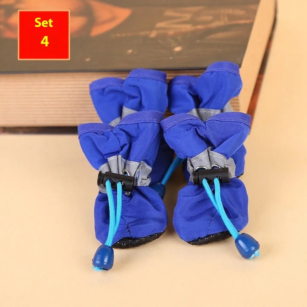 Set of four cloth dog shoes with soft soles in Rose Red colour showing non-slip bottoms