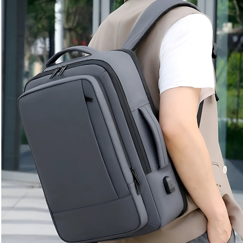Men's large capacity waterproof Oxford cloth backpack in black with curved shoulder strap