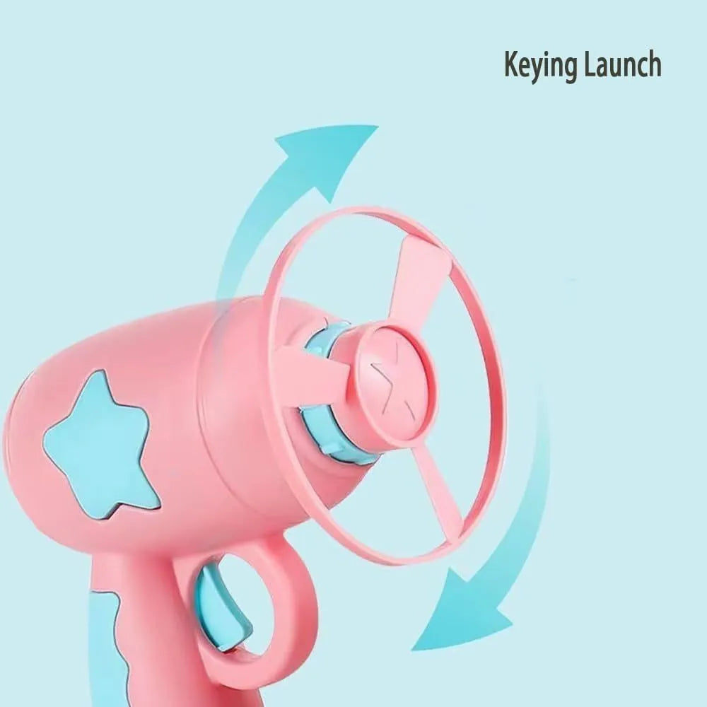 Blue and pink plastic cat toy gun with frisbee measuring 11cm for indoor feline play
