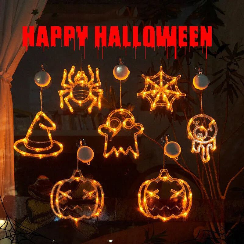Halloween window hanging LED lights 7-piece set with spider pumpkin ghost designs on display