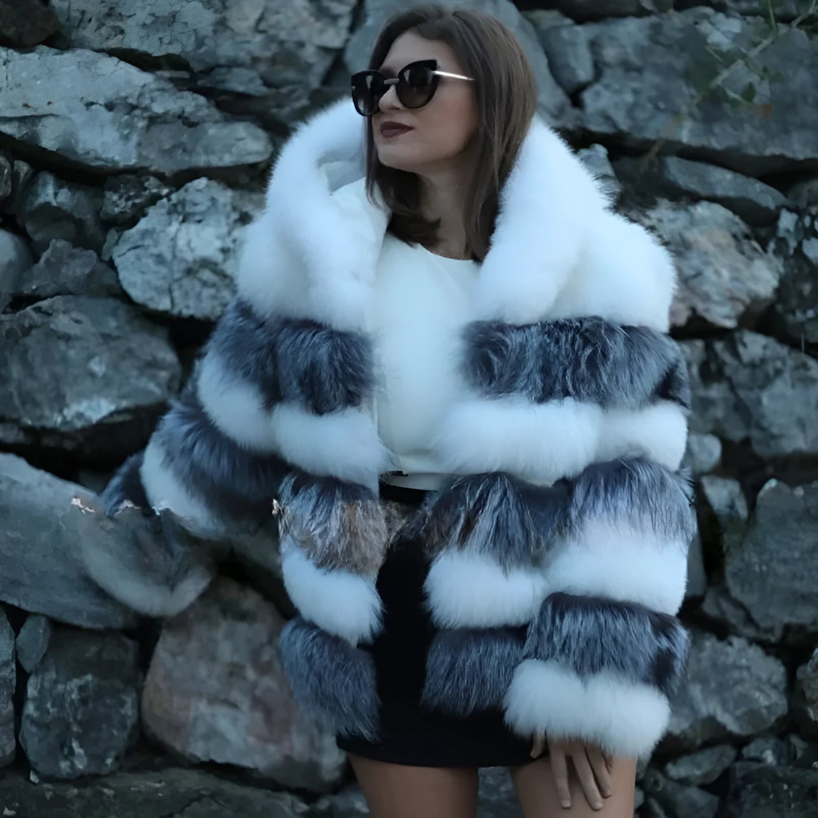 Women's loose fit hooded faux fur coat in street fashion style showing brown colour option